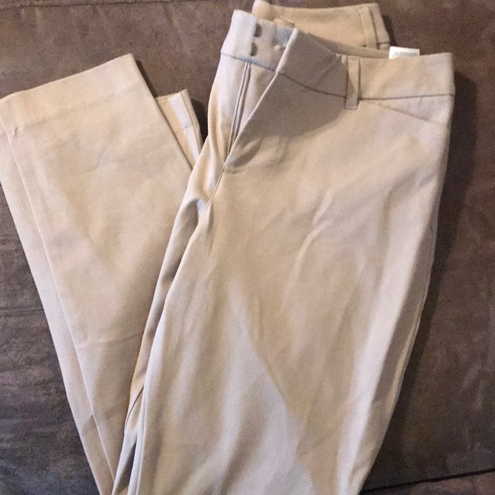 Khaki colored slacks. Regular leg